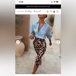 Never fully dressed Leopard Print Wrap Skirt sz s/m euc